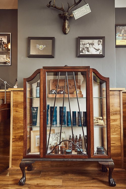 Bond's Barbershop Wareham - Products in a cabinet